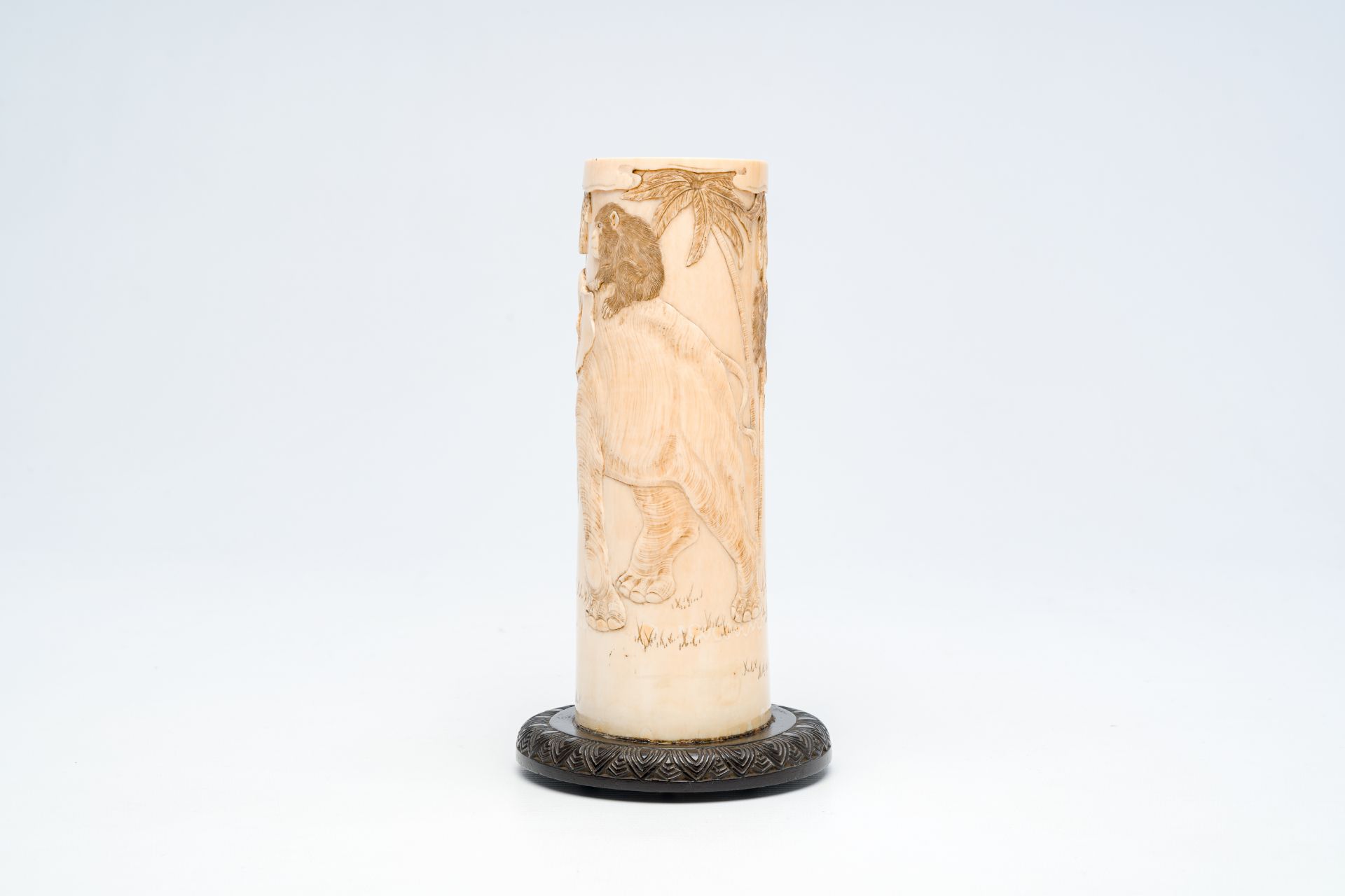 A Japanese carved ivory 'elephant and monkeys' brush pot, Meiji, late 19th C. - Image 4 of 6