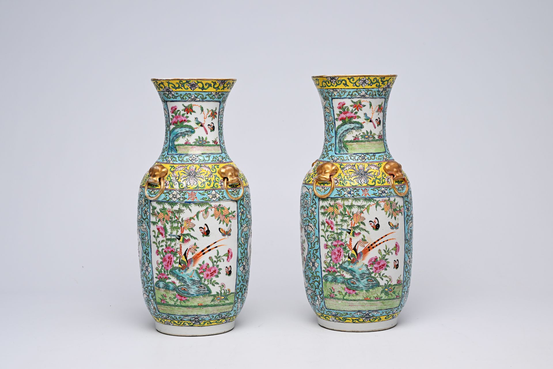 A pair of Chinese Canton famille rose turquoise ground vases with birds and butterflies among blosso - Bild 3 aus 13