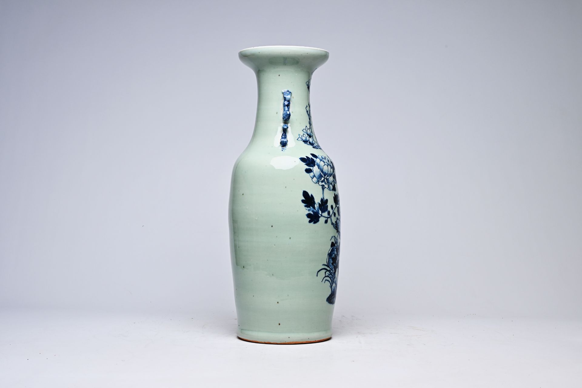 A Chinese blue and white celadon ground vase with birds among blossoming branches, 19th C. - Image 4 of 8