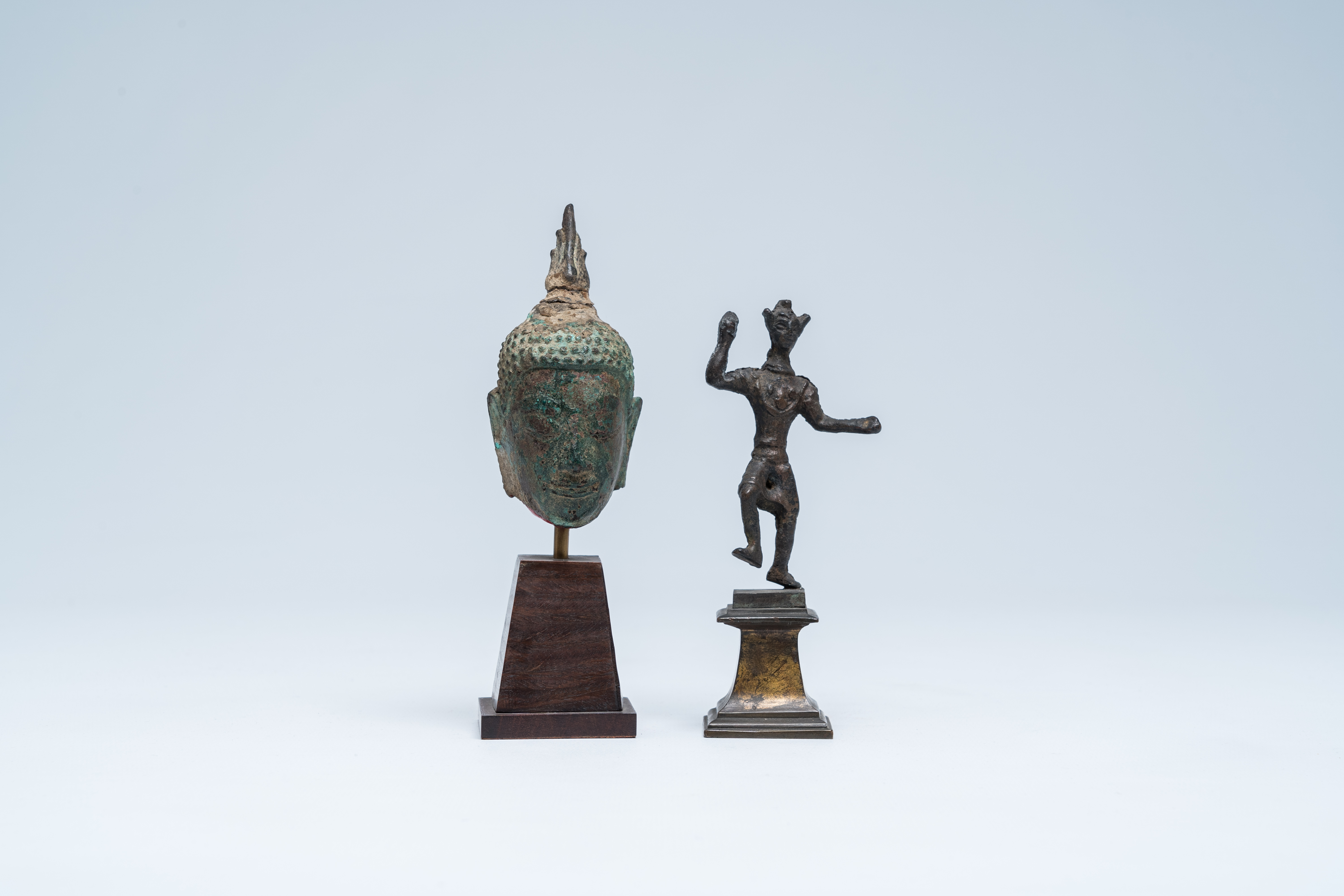 A bronze head of Buddha and a sculpture of a ritual dancer, Southeast Asia, 13th/17th C. - Image 2 of 7