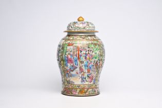 A fine Chinese Canton famille rose vase and cover with palace scenes and floral design, 19th C.