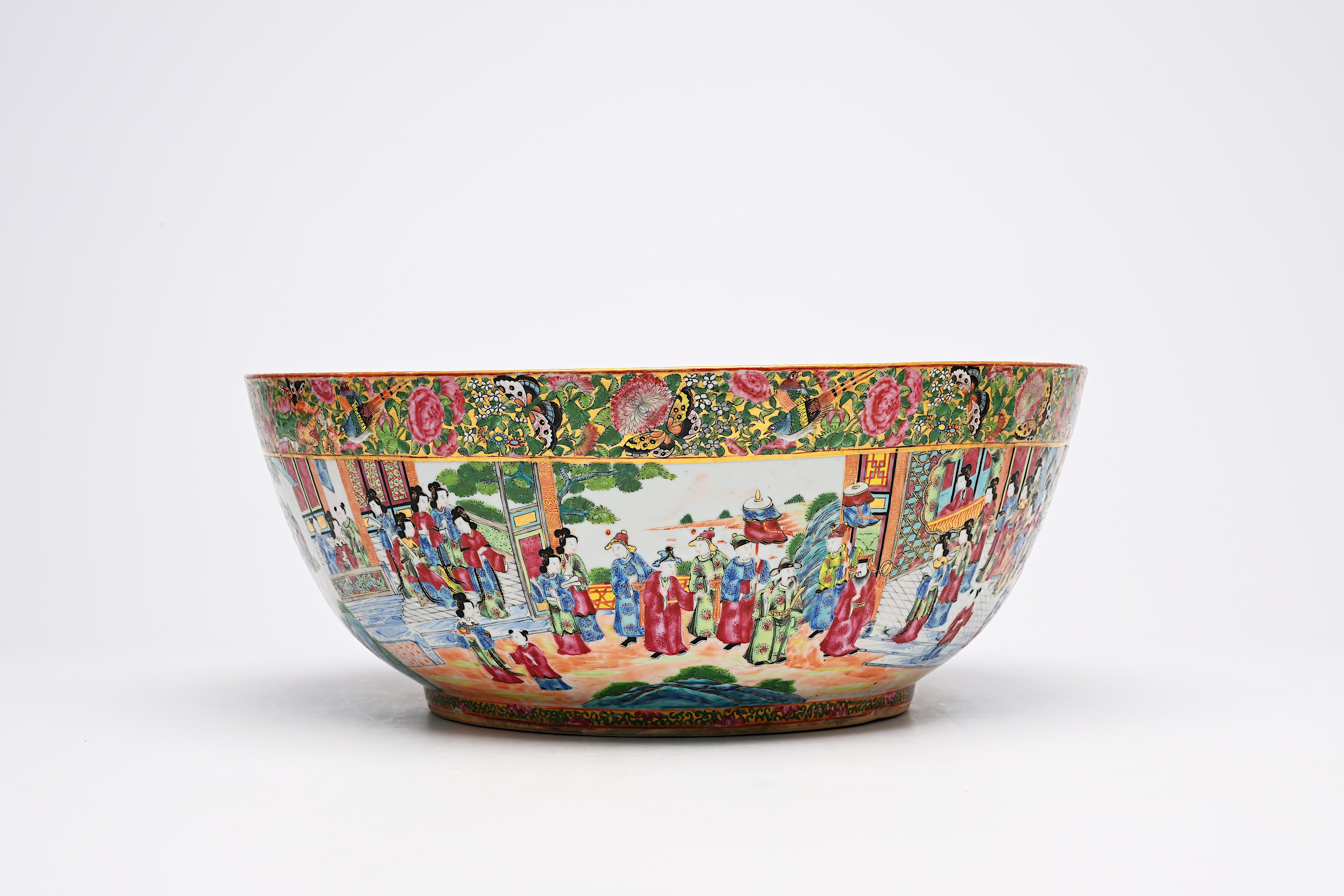 A large Chinese Canton famille rose bowl with floral design and palace scenes, 19th C. - Image 7 of 9