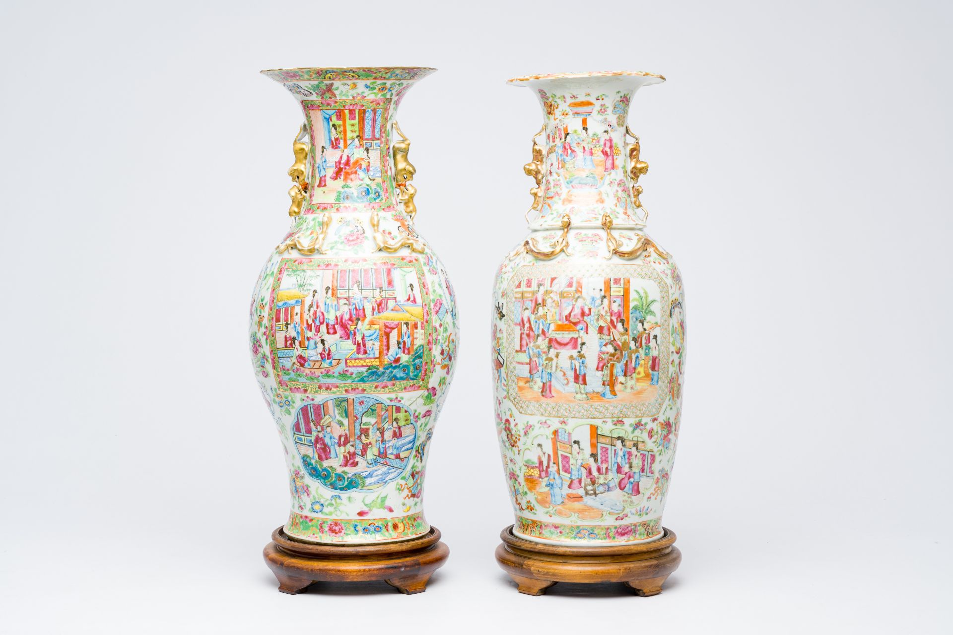 Two Chinese Canton famille rose vases with palace scenes and floral design, 19th C.