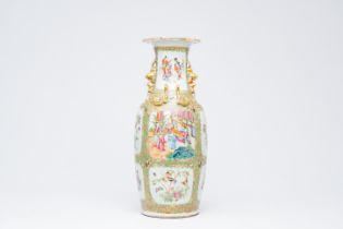 A Chinese Canton famille rose vase with palace scenes and birds and butterflies among blossoming bra