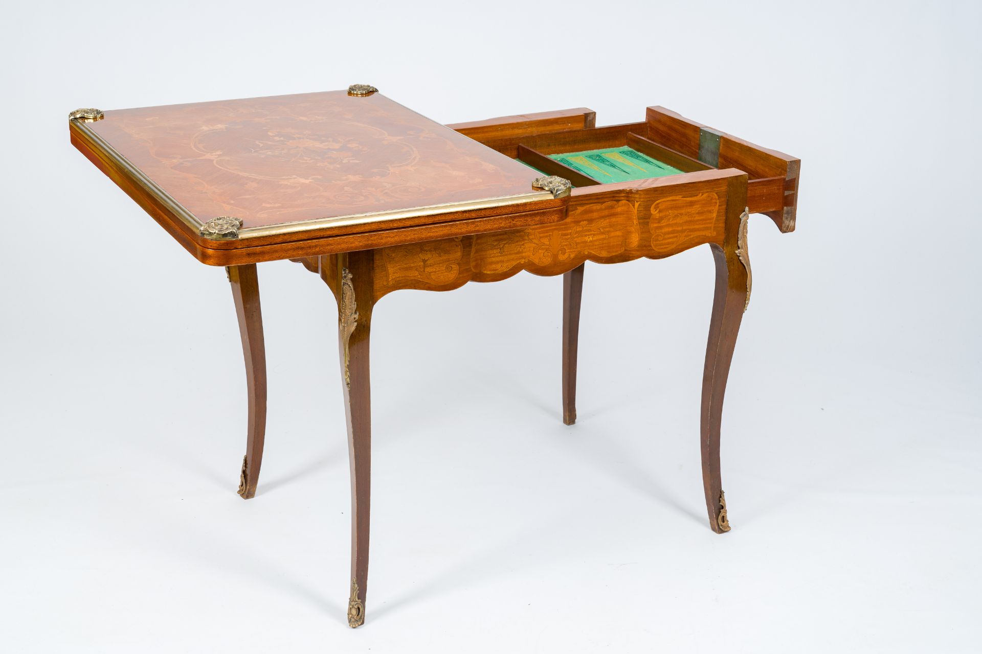 A French bronze mounted wood game table with marquetry top, 19th/20th C. - Image 2 of 10
