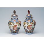 A pair of French Samson Imari style 'hunting eagles' vases and covers, Paris, 19th C.