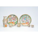 A varied collection of Chinese Canton famille rose porcelain with palace scenes and floral design, 1