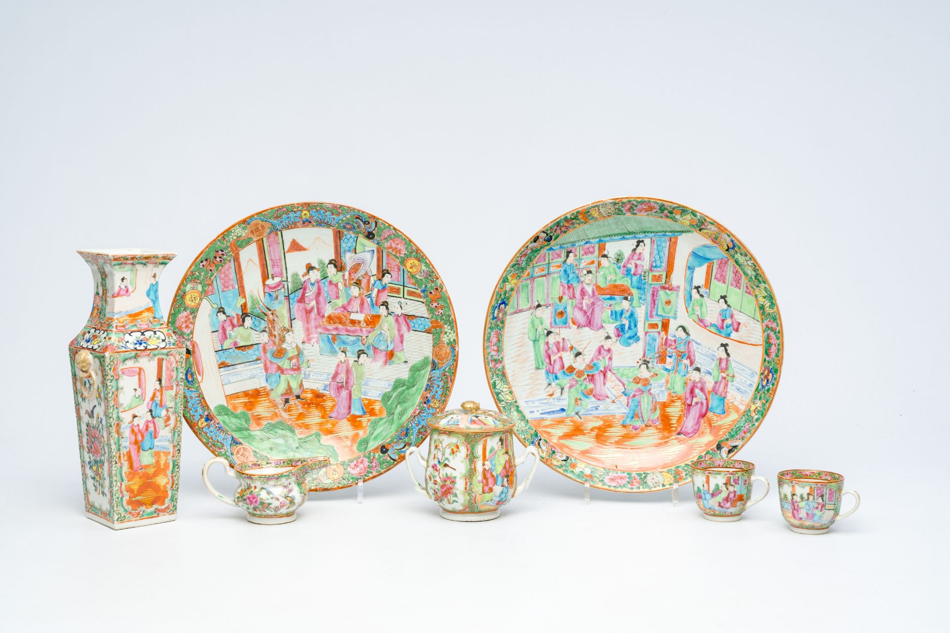A varied collection of Chinese Canton famille rose porcelain with palace scenes and floral design, 1
