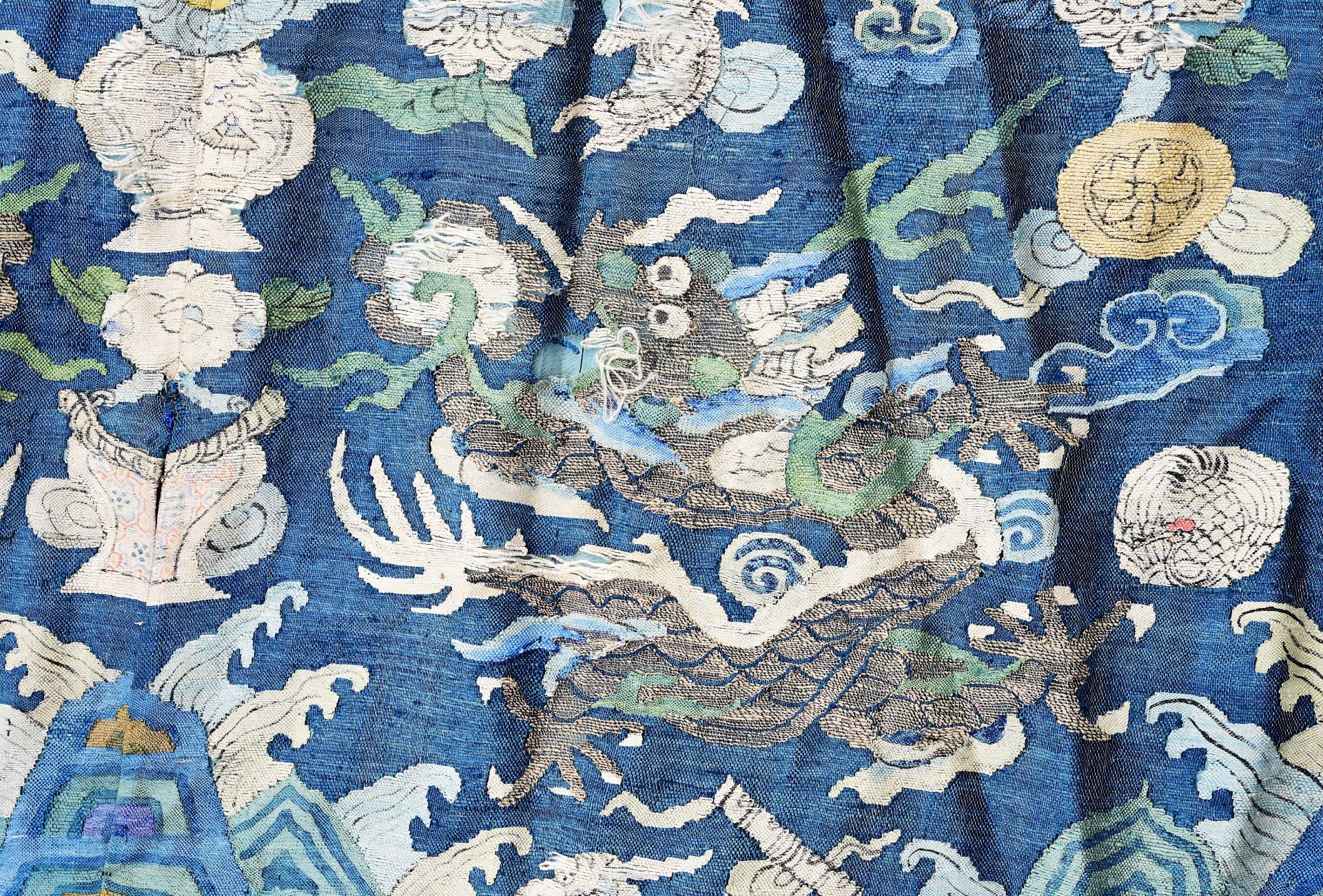 A Chinese embroidered silk 'dragons chasing the pearl' robe, 19th C. - Image 6 of 9