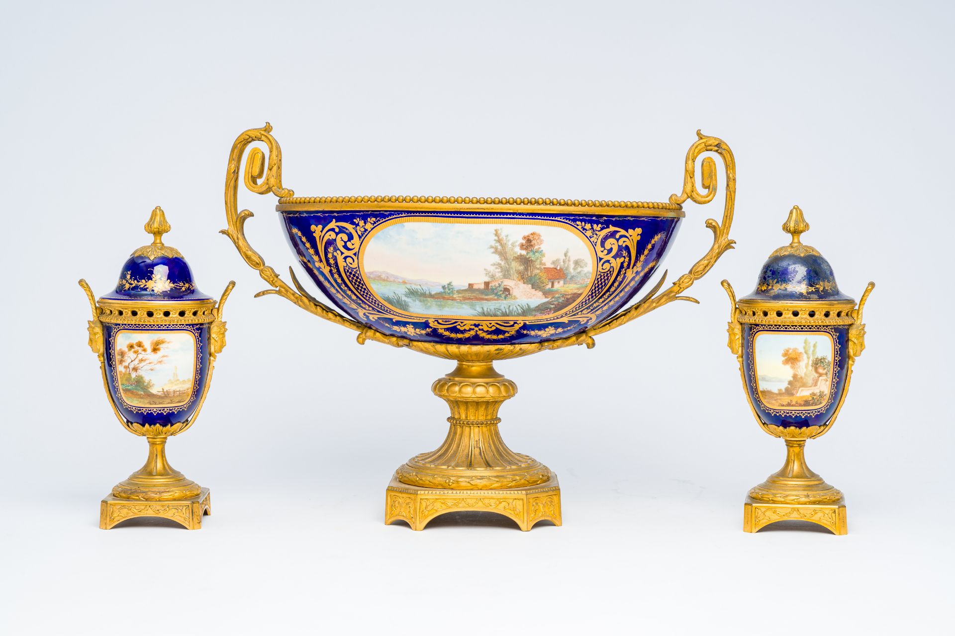A three piece Sevres-style porcelain garniture with gilt bronze mounts, France, 19th C. - Image 2 of 7