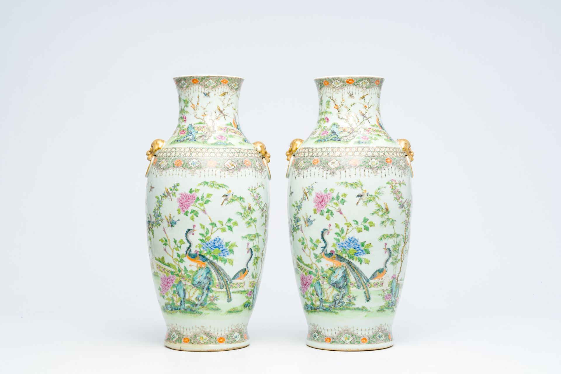 A pair of Chinese Canton famille rose vases with birds among blossoming branches, 19th C. - Image 3 of 6