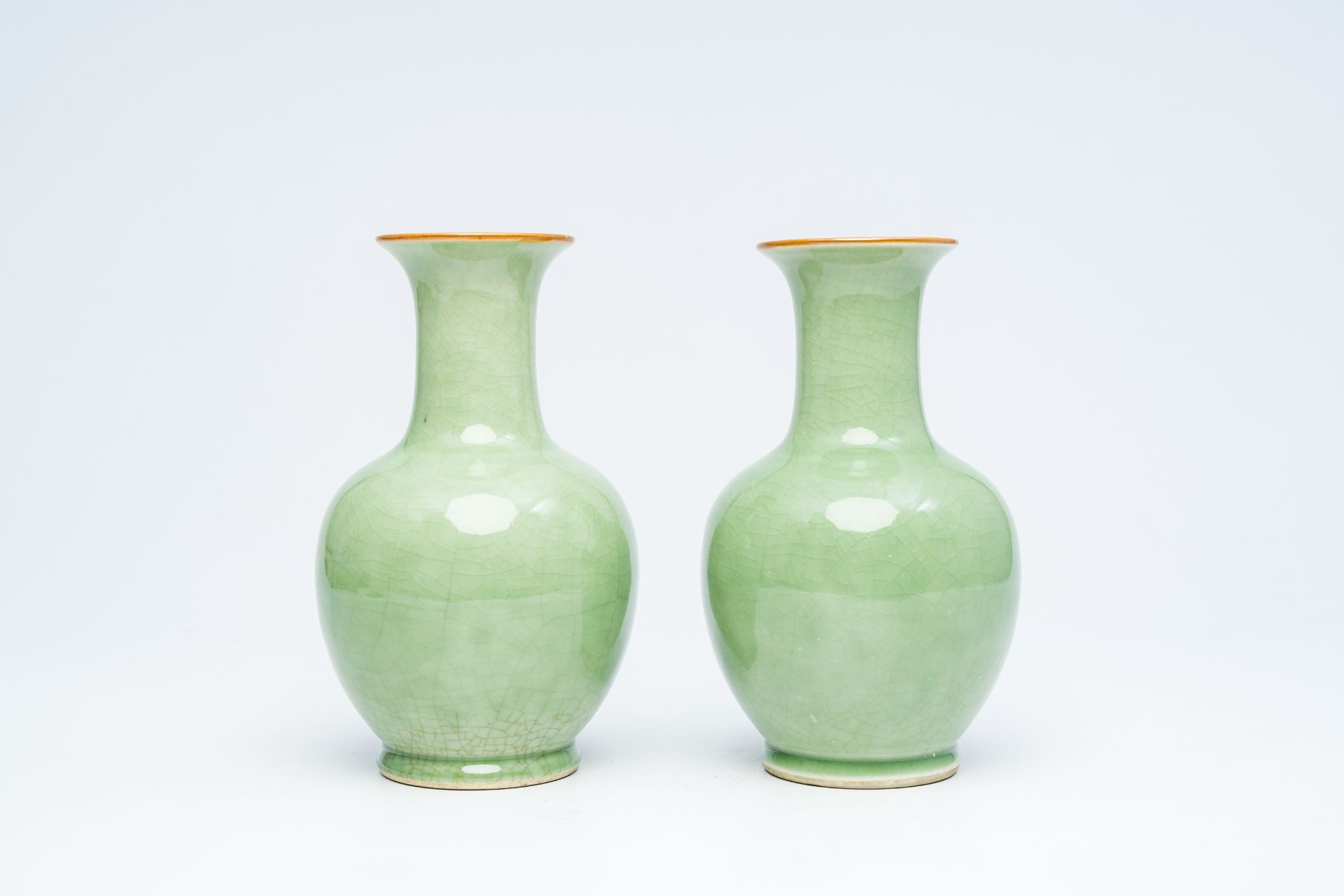 A pair of Chinese celadon-glazed bottle vases, 20th C. - Image 5 of 12