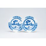 A pair of Chinese blue and white soft paste 'dogs and pigeons' plates, Qianlong