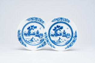 A pair of Chinese blue and white soft paste 'dogs and pigeons' plates, Qianlong