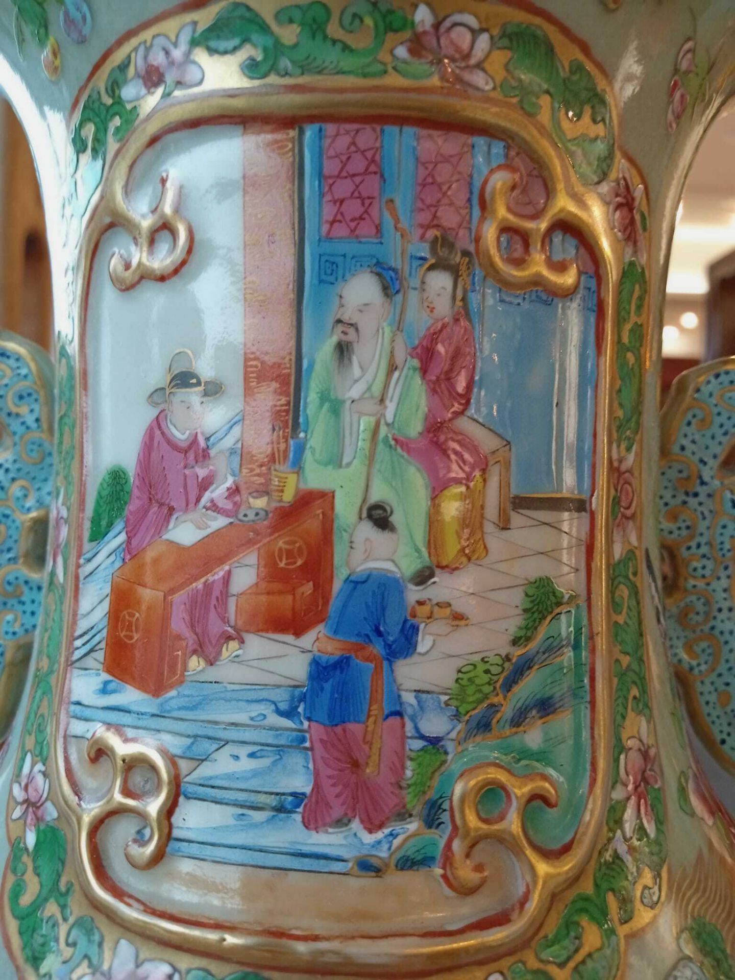 A pair of Chinese Canton famille rose celadon ground vases with palace scenes, animals and antiquiti - Image 28 of 64