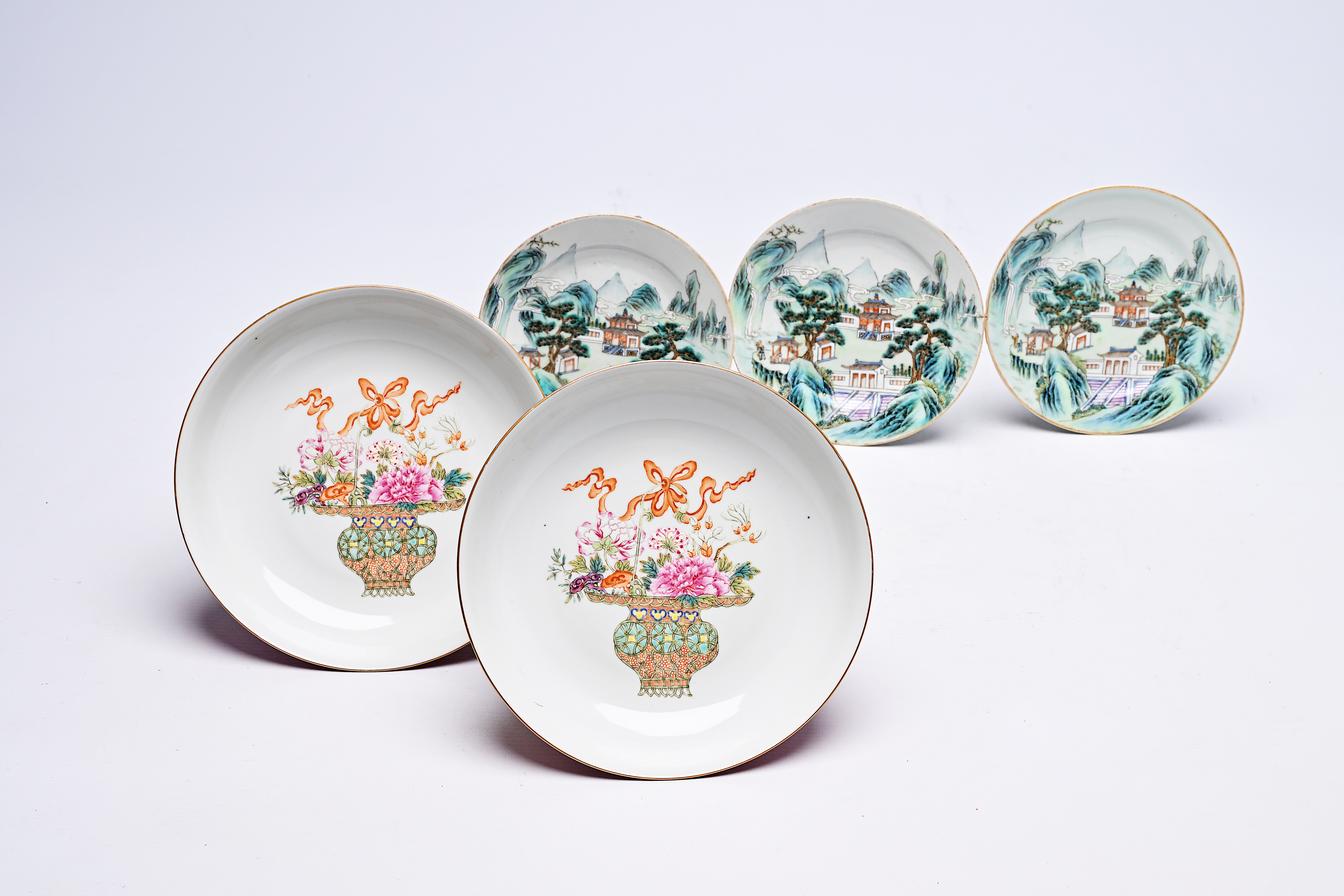 Five Chinese famille rose and qianjiang cai plates with flower baskets and animated landscapes, 20th