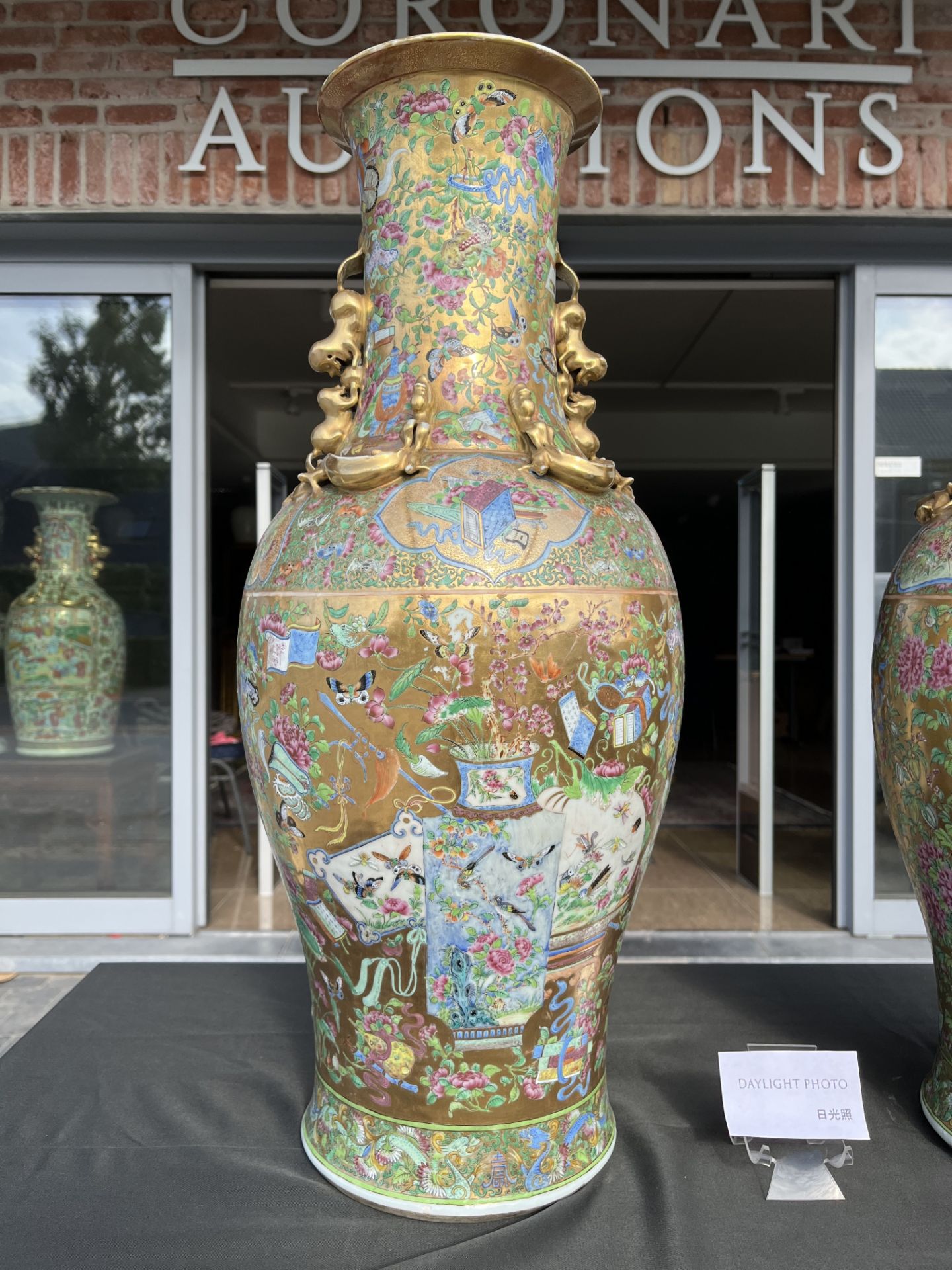 A pair of Chinese Canton famille rose gold ground vases with birds and butterflies among blossoming - Image 15 of 60