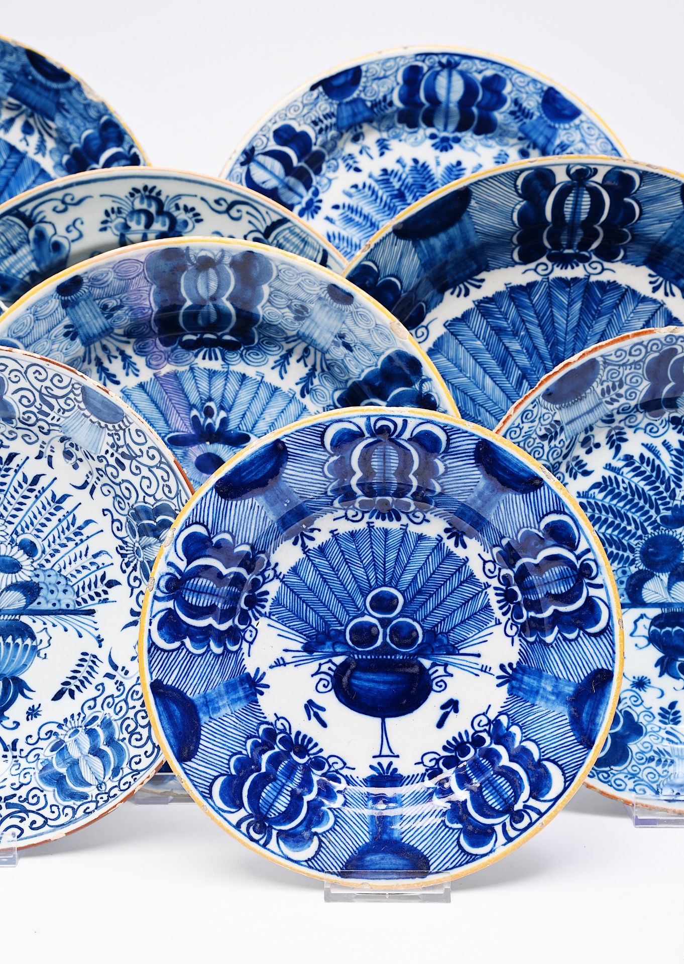Sixteen Dutch Delft blue and white 'peacock tail' plates and dishes, 18th C. - Image 2 of 6