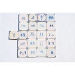 Twenty-one Dutch Delft blue and white 'children's games' tiles, 17th/18th C.