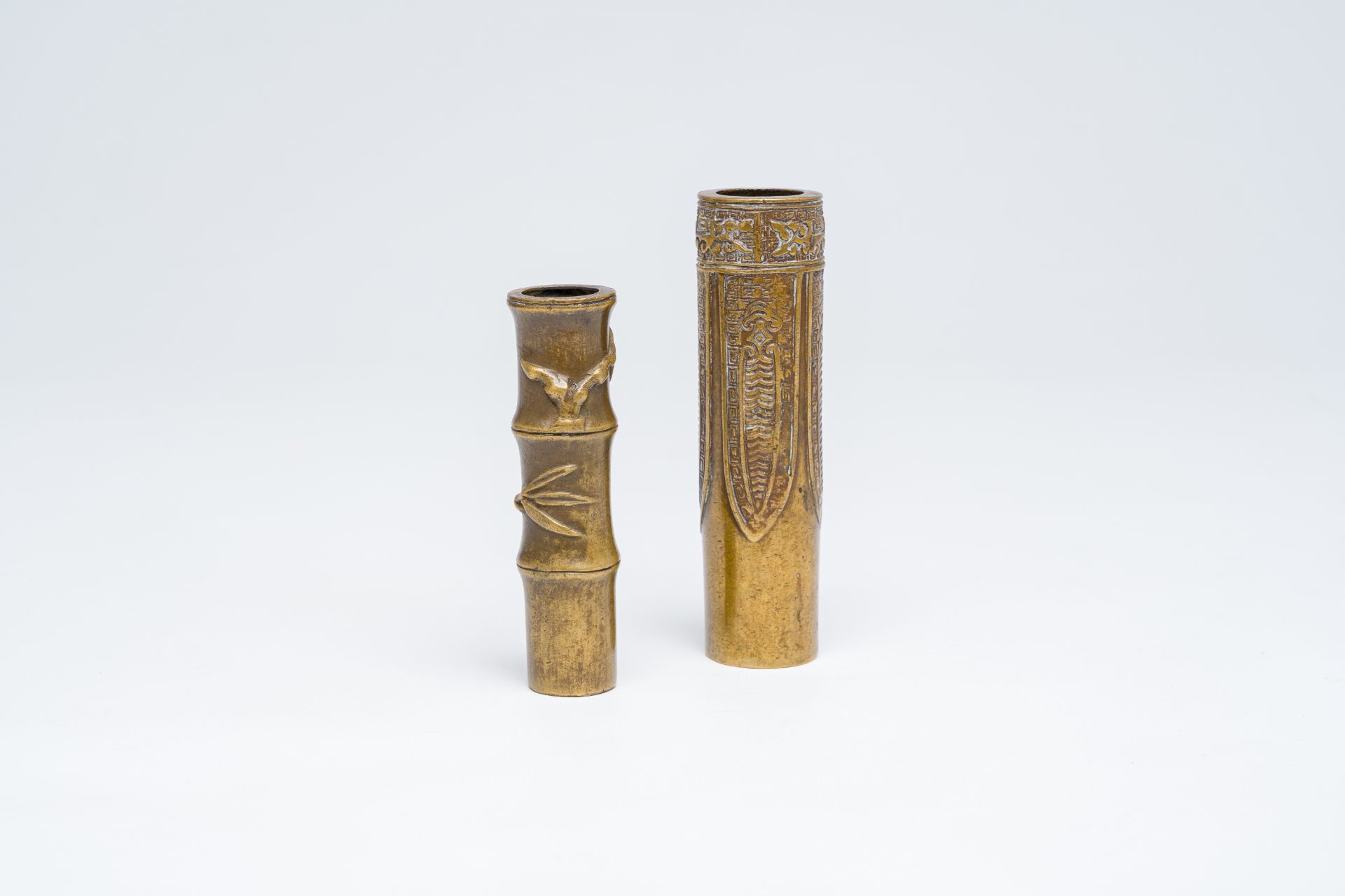 Two Chinese bronze joss stick holders, 19th C.