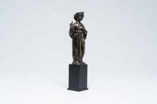 A Flemish or French patinated bronze standing and blessing angel, 16th C.