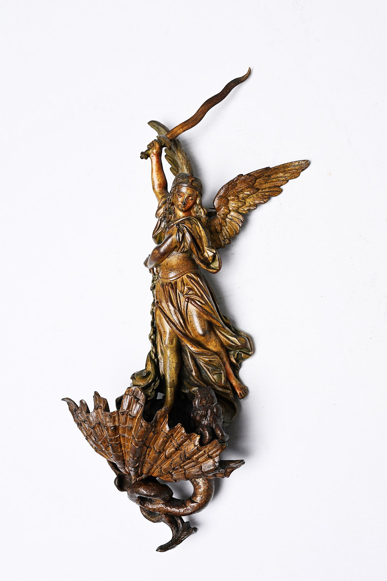 A Belgian bronze holy water font depicting Saint Michael and the dragon, 19th C.