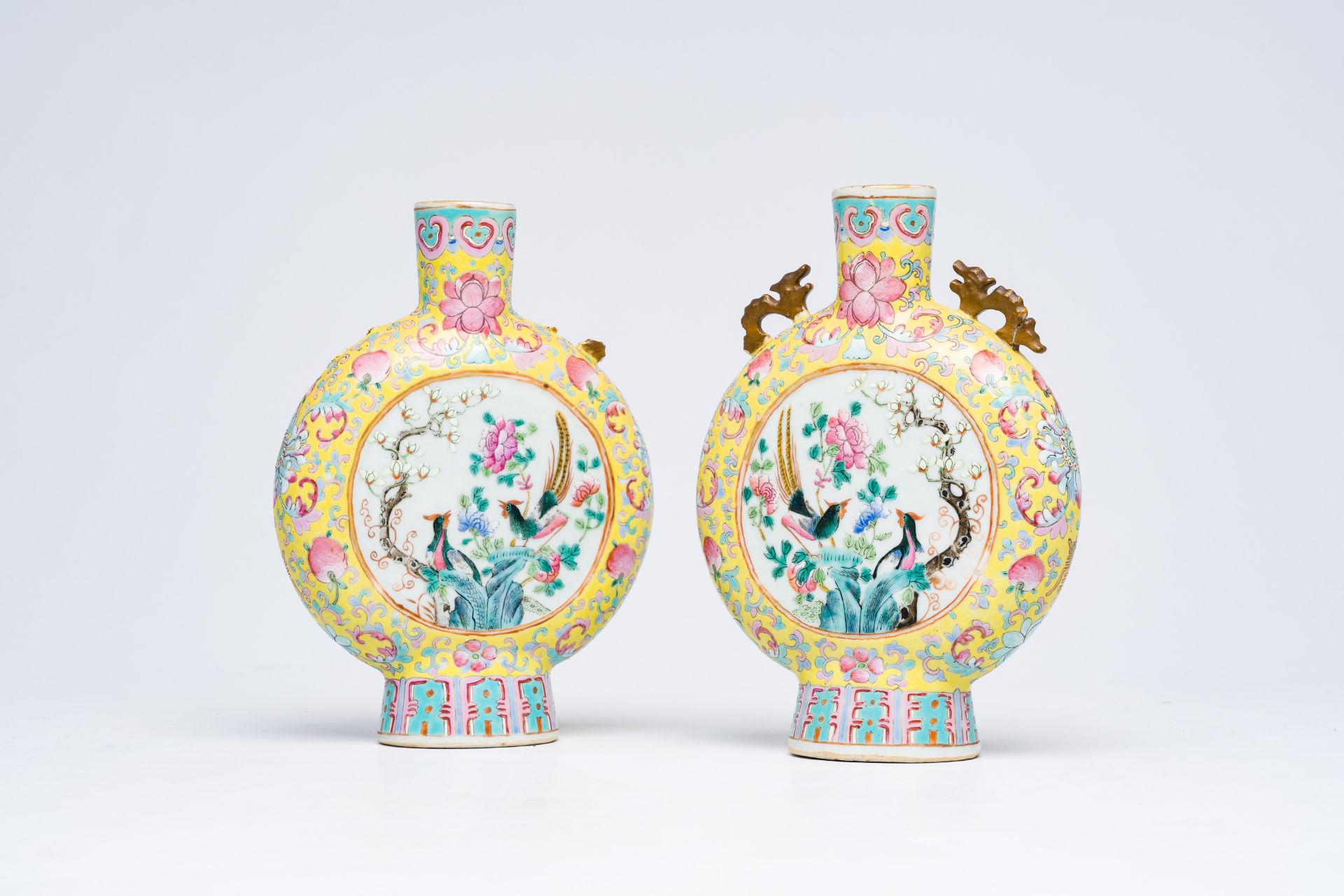 A pair of Chinese famille rose yellow ground moon flasks with warrior scenes and pheasants among blo - Bild 8 aus 8