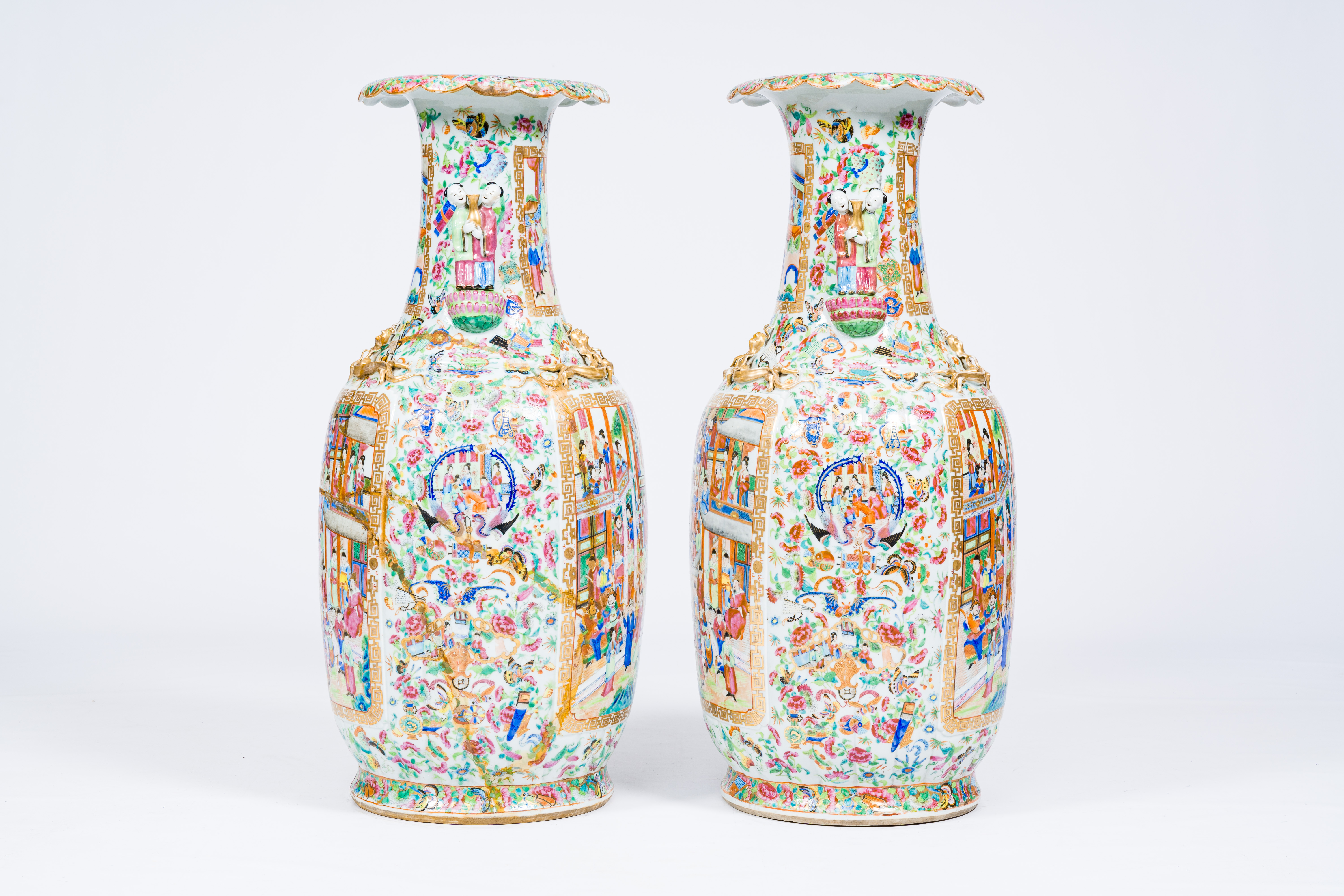 A pair of large ribbed Chinese Canton famille rose vases with palace scenes and the Hehe Er Xian twi - Image 4 of 6