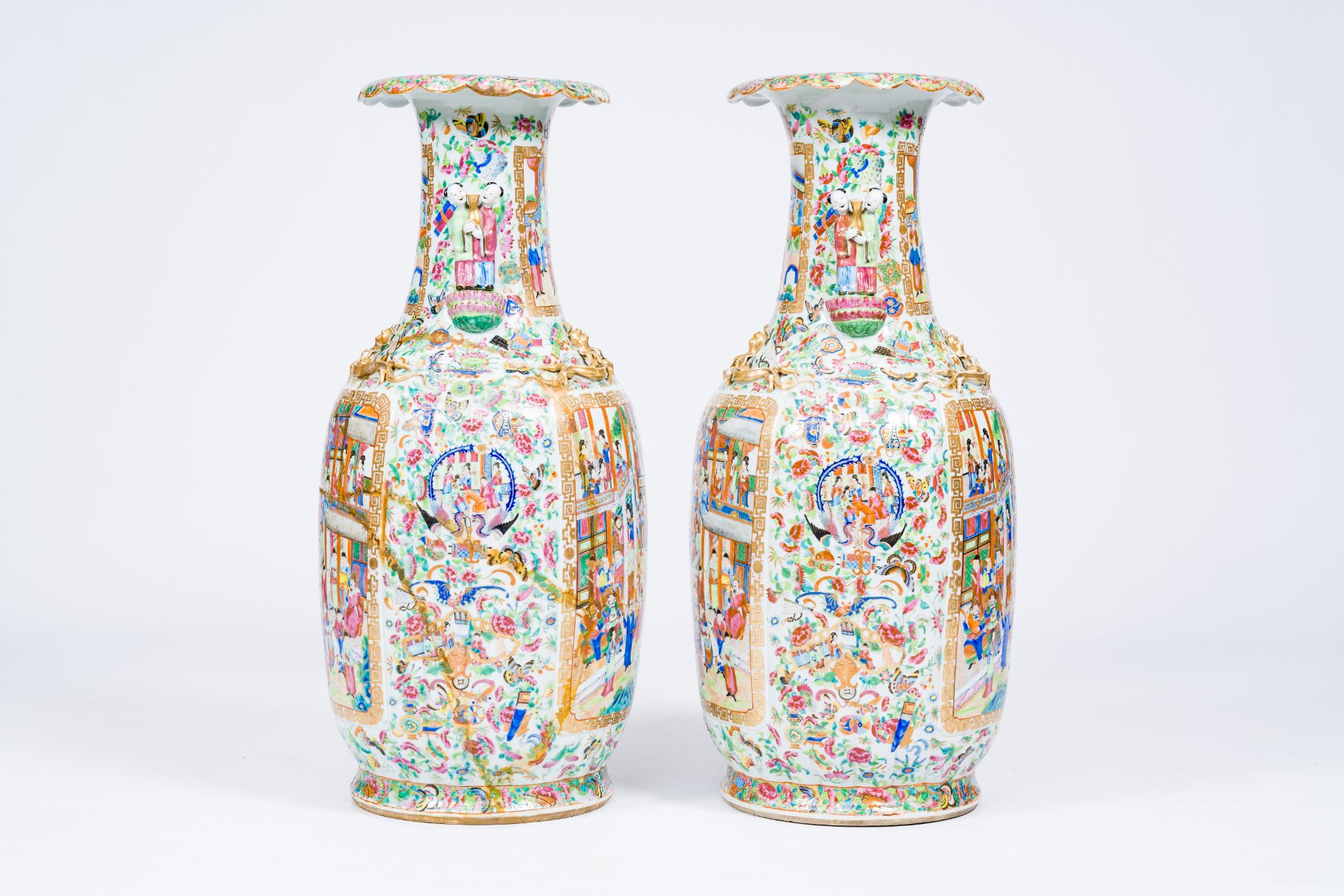 A pair of large ribbed Chinese Canton famille rose vases with palace scenes and the Hehe Er Xian twi - Image 4 of 6