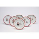 Six Chinese famille rose plates with antiquities and floral design, Qianlong