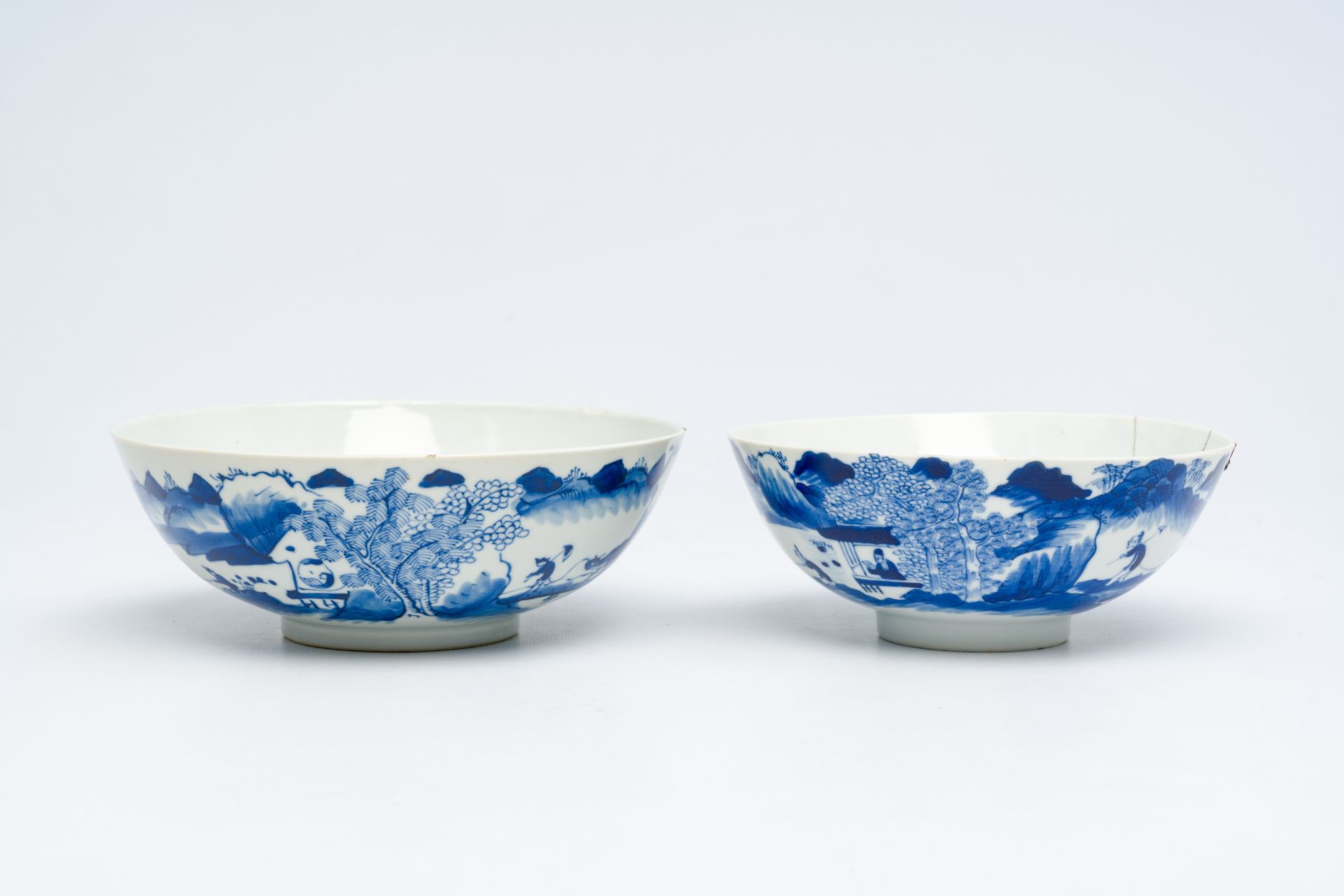Two Chinese blue and white 'animated landscape' bowls, 19th C.