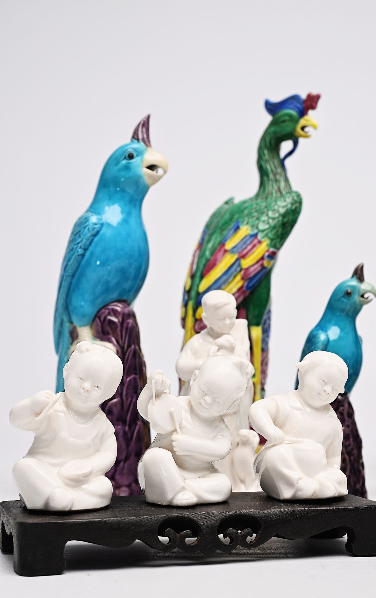 A pair of Chinese famille rose phoenixes, two pairs of turquoise parrots and nine blanc de Chine fig - Image 8 of 51