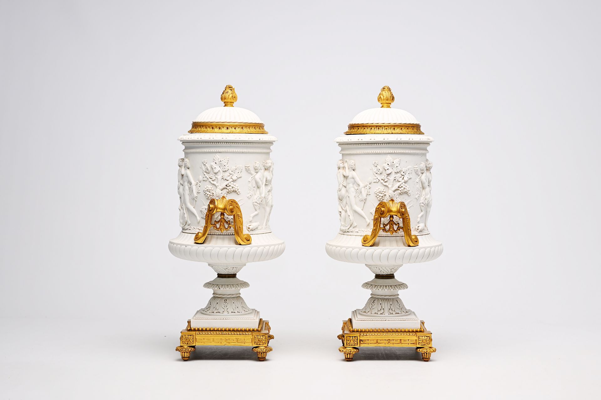 A pair of French biscuit gilt bronze mounted vases and covers with a frieze with bacchantes, Sevres - Image 4 of 14