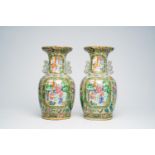 A pair of Chinese Canton famille rose celadon ground vases with palace scenes, animals and antiquiti