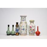 Six Chinese famille rose, monochrome and Nanking crackle glazed blue and white vases, three of which