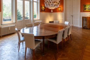 A large French oval bronze mounted wood Directoire style table decorated with diamonds, ca. 1800