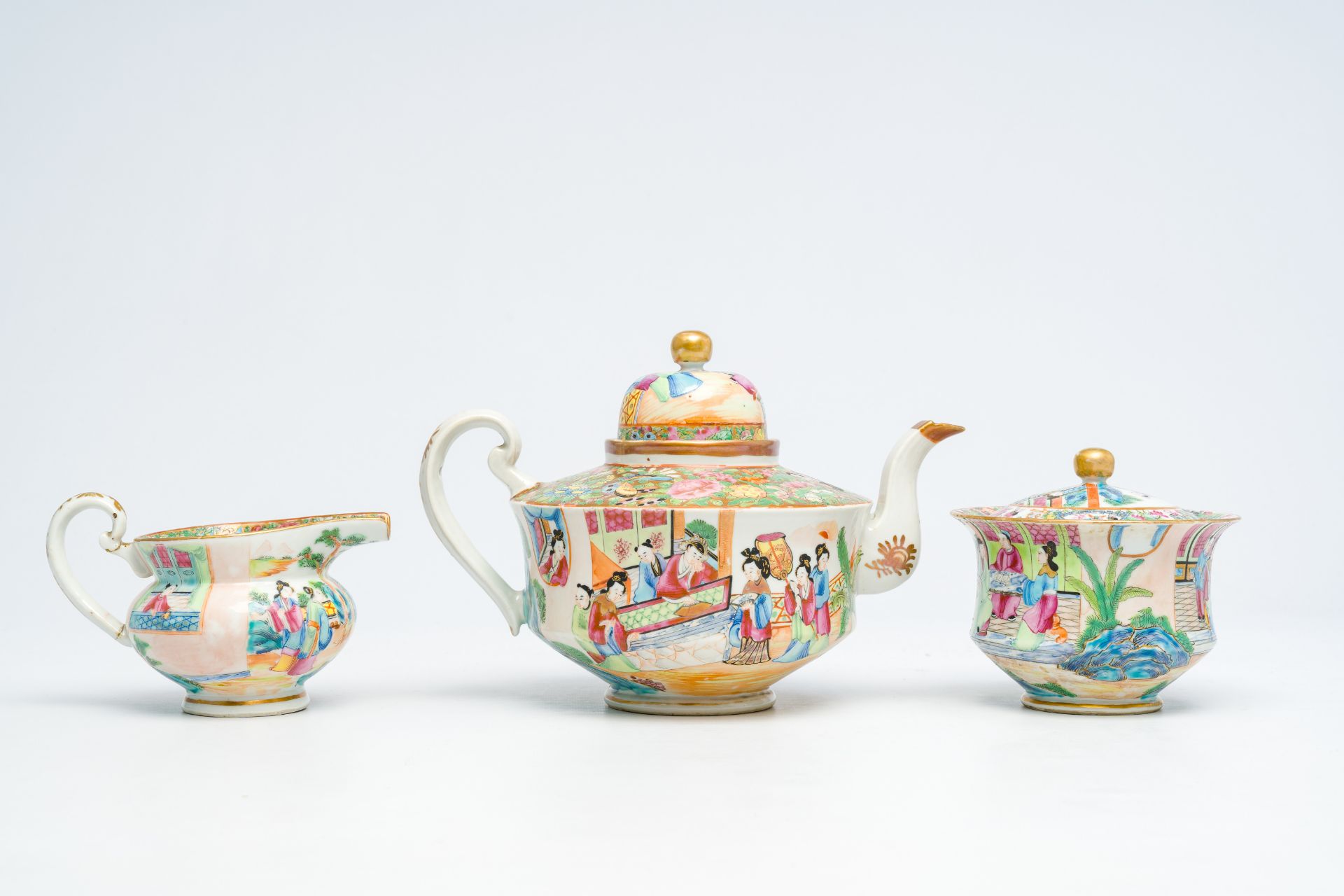 A Chinese Canton famille rose three-part tea set with palace scenes, 19th C. - Image 3 of 7