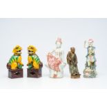 Five various Chinese famille rose and polychrome porcelain and pottery figures, 19th/20th C.