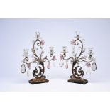 A pair of French gilt metal S-shaped candelabra with cut amethyst and amber crystal by Baccarat, pro