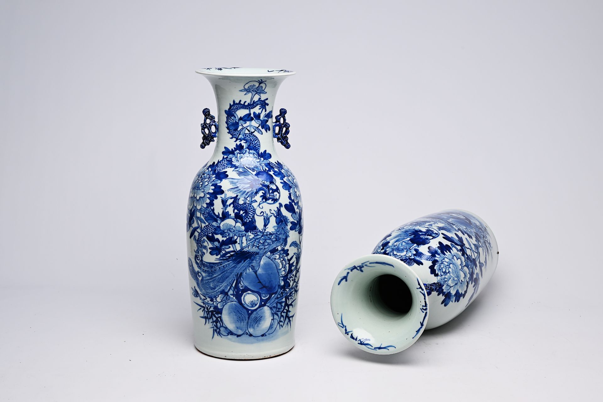 A pair of Chinese blue and white celadon ground vases with a dragon and a phoenix among blossoming b - Image 26 of 28