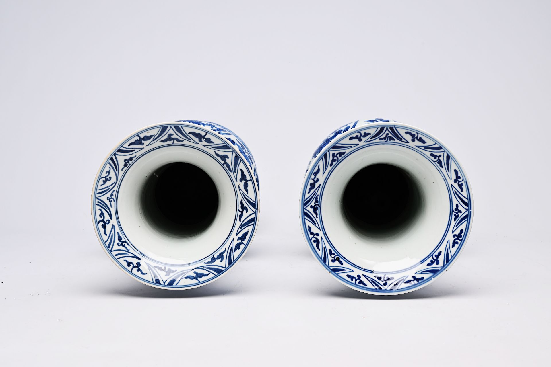 A pair of Chinese blue and white 'gu' vases with dragons and floral design, Qianlong mark, Republic, - Image 15 of 22