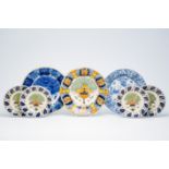 Seven Dutch Delft blue, white and polychrome plates and dishes with floral and chinoiserie design, 1