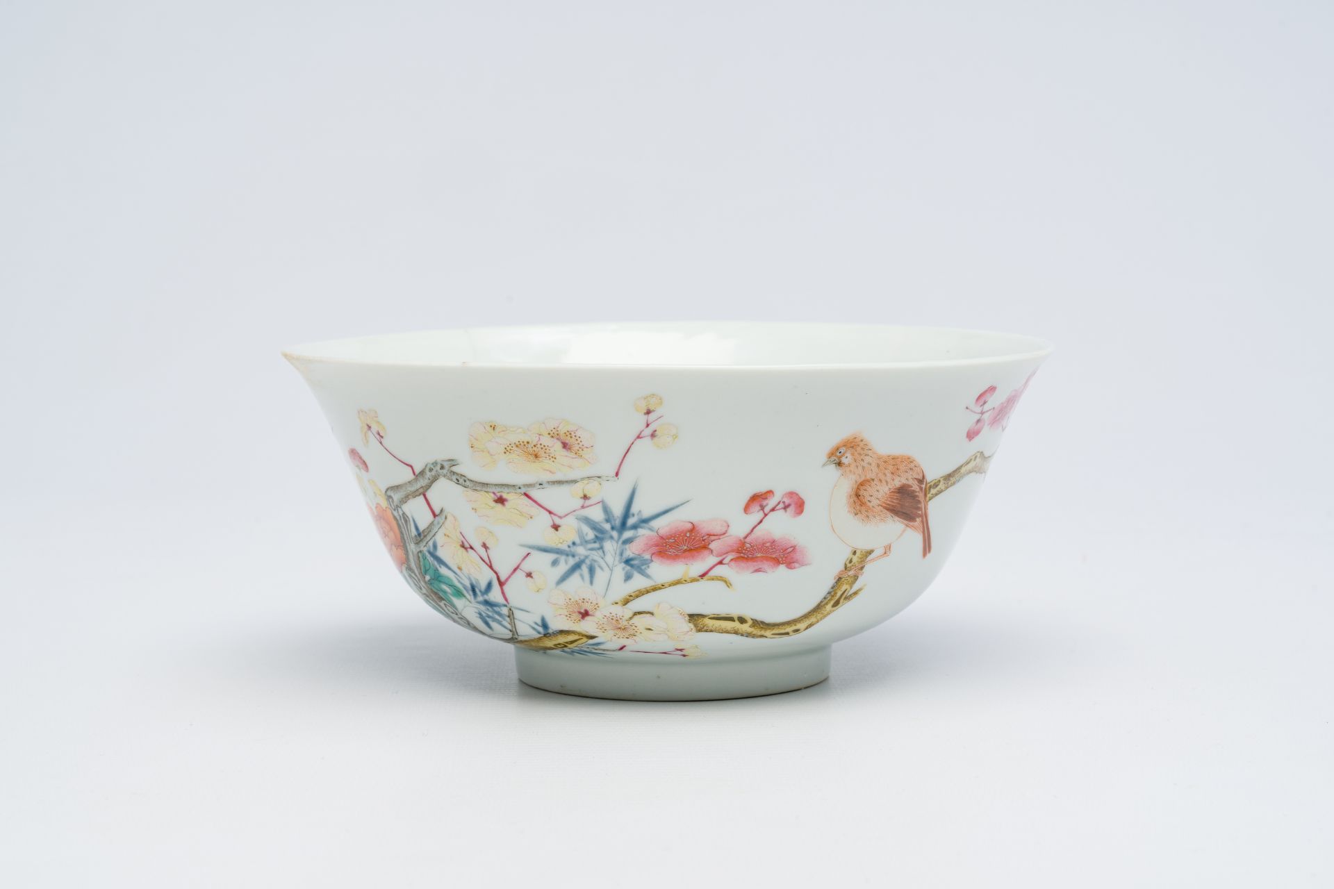 A Chinese famille rose bowl with birds among blossoming branches, Yongzheng mark, Republic