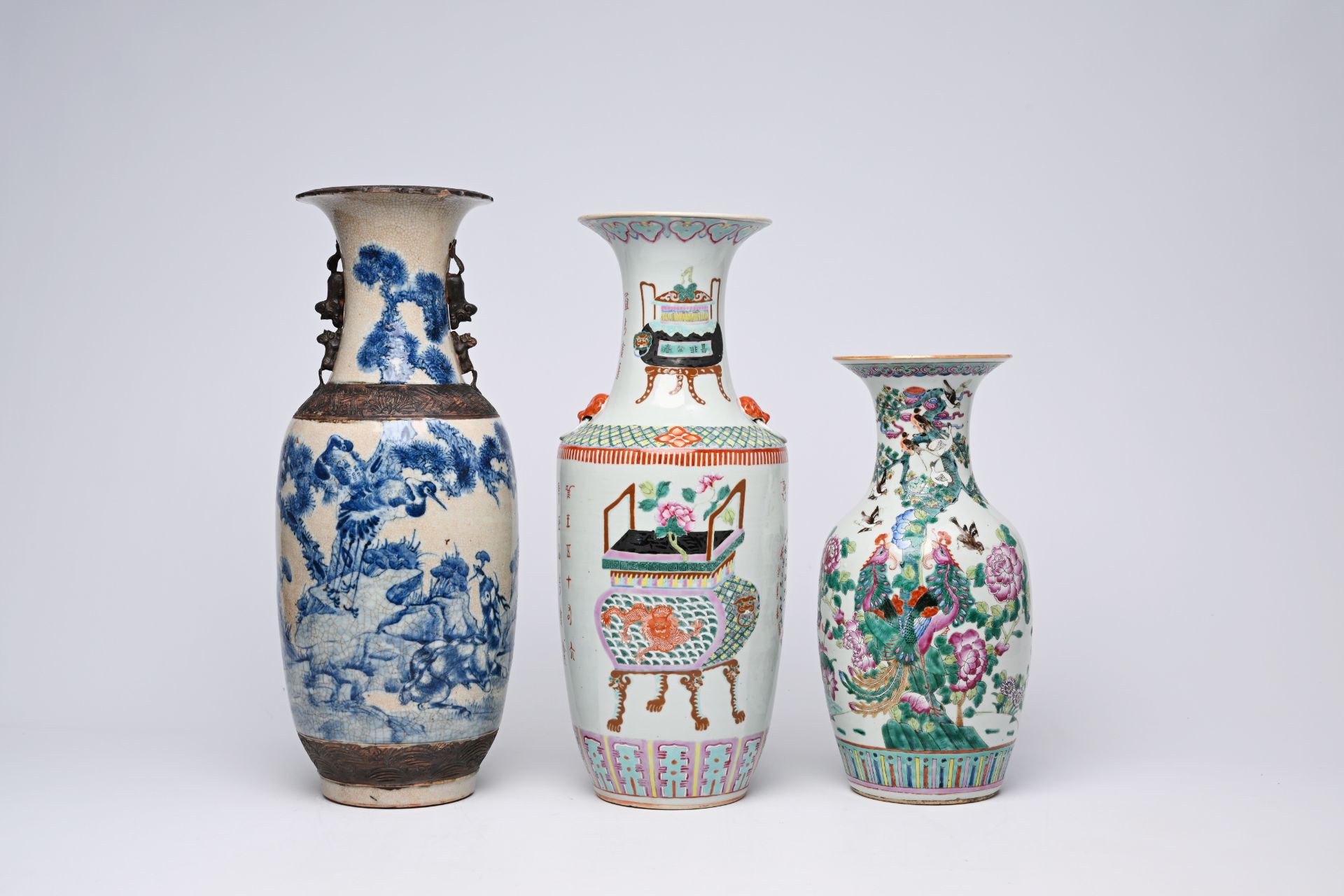 Two various Chinese famille rose vases and a Nanking crackle glazed blue and white vase with cranes