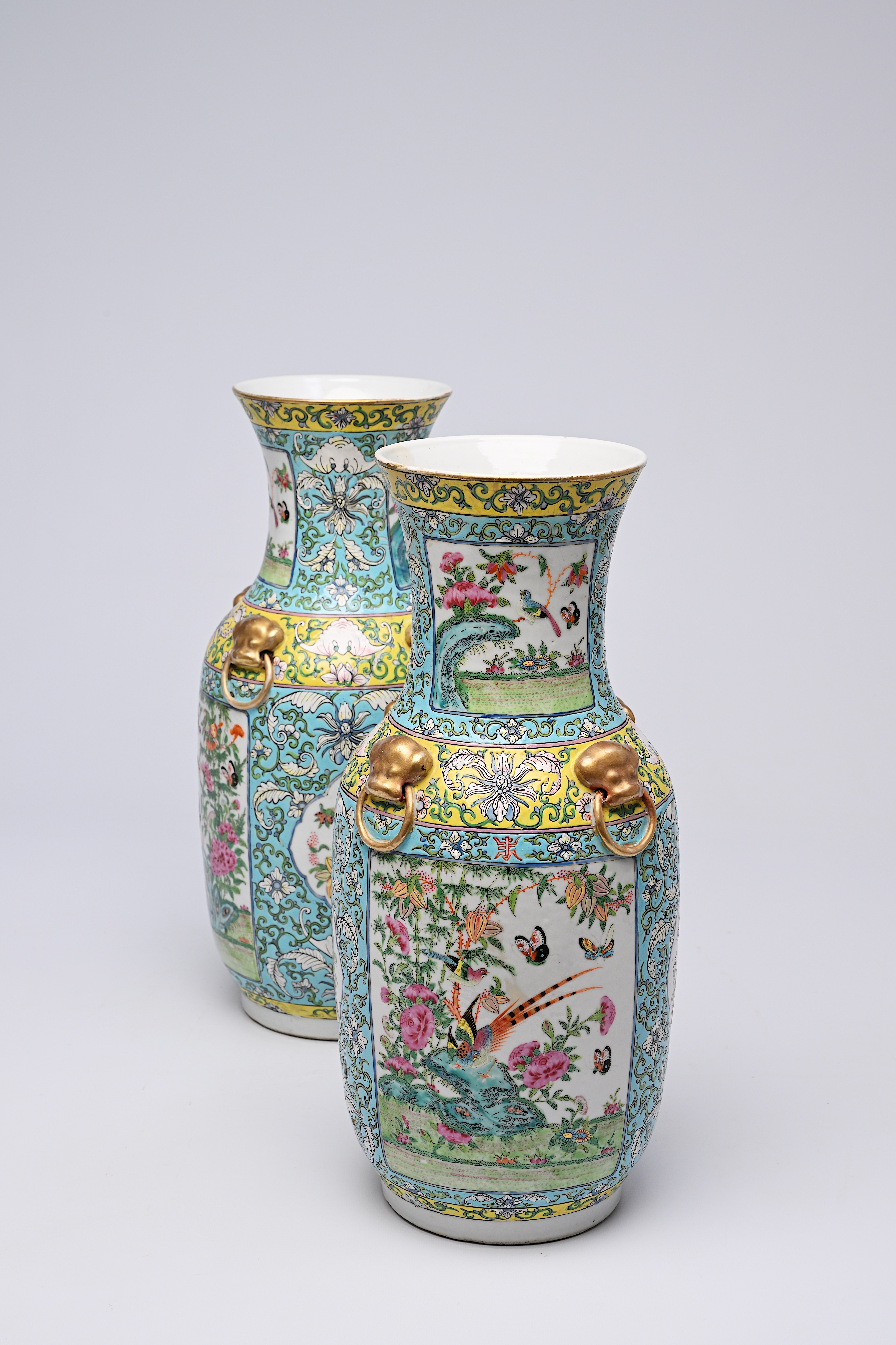 A pair of Chinese Canton famille rose turquoise ground vases with birds and butterflies among blosso - Image 13 of 13