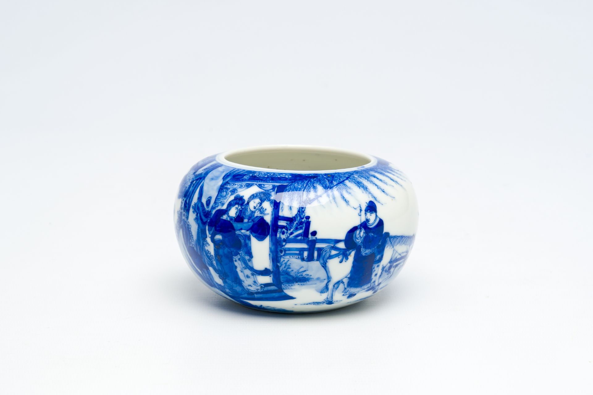 A fine Chinese blue and white brush washer with an animated scene all around, Kangxi mark, 19th C.