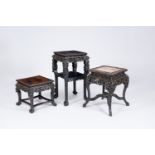 Three Chinese reticulated hardwood stands, 19th/20th C.