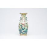 A Chinese Canton famille rose celadon ground vase with animals and figures among flowering branches,