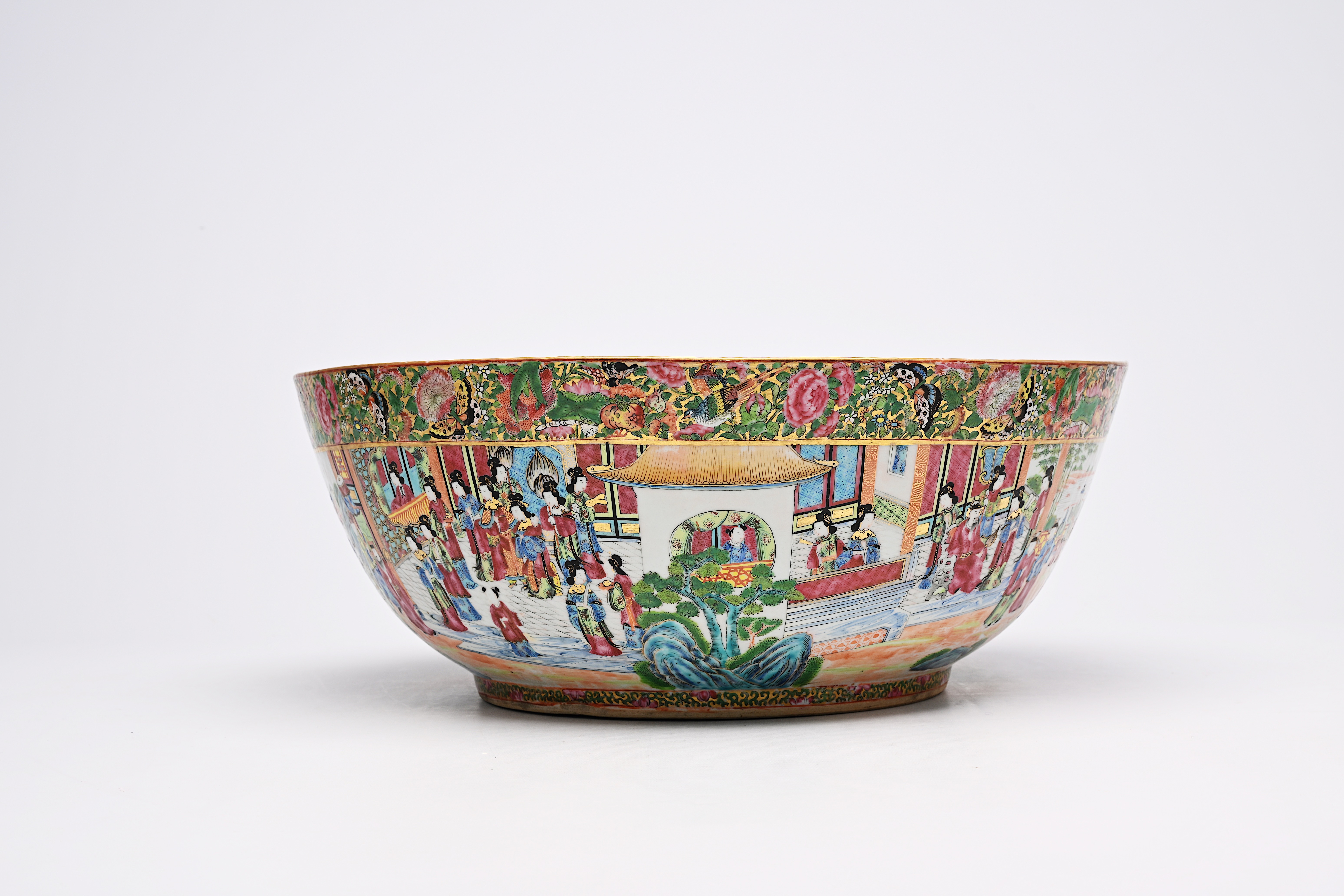 A large Chinese Canton famille rose bowl with floral design and palace scenes, 19th C. - Image 6 of 9