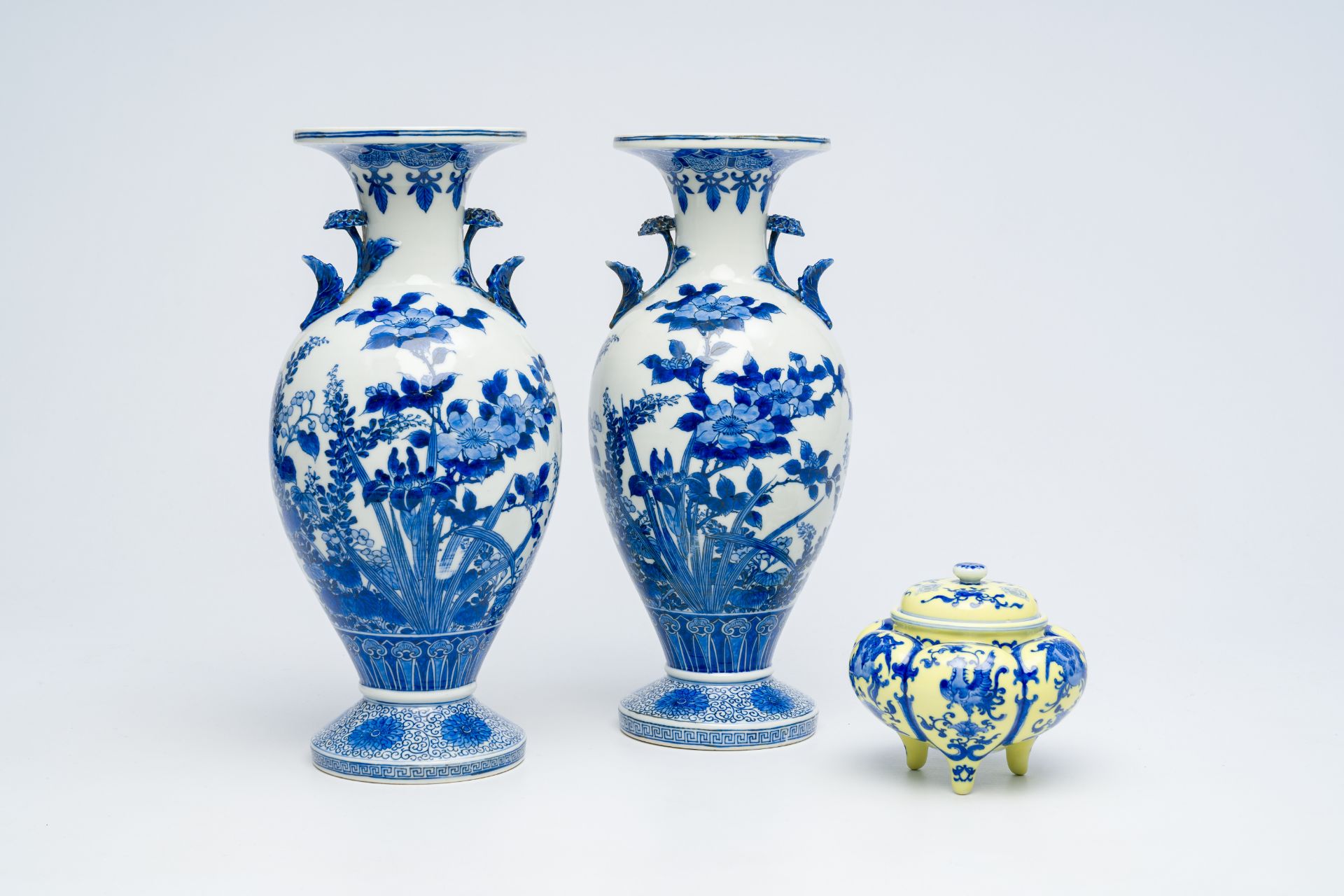 A Japanese yellow-ground incense burner and a pair of blue and white vases, poss. Hirado, Meiji, 19t